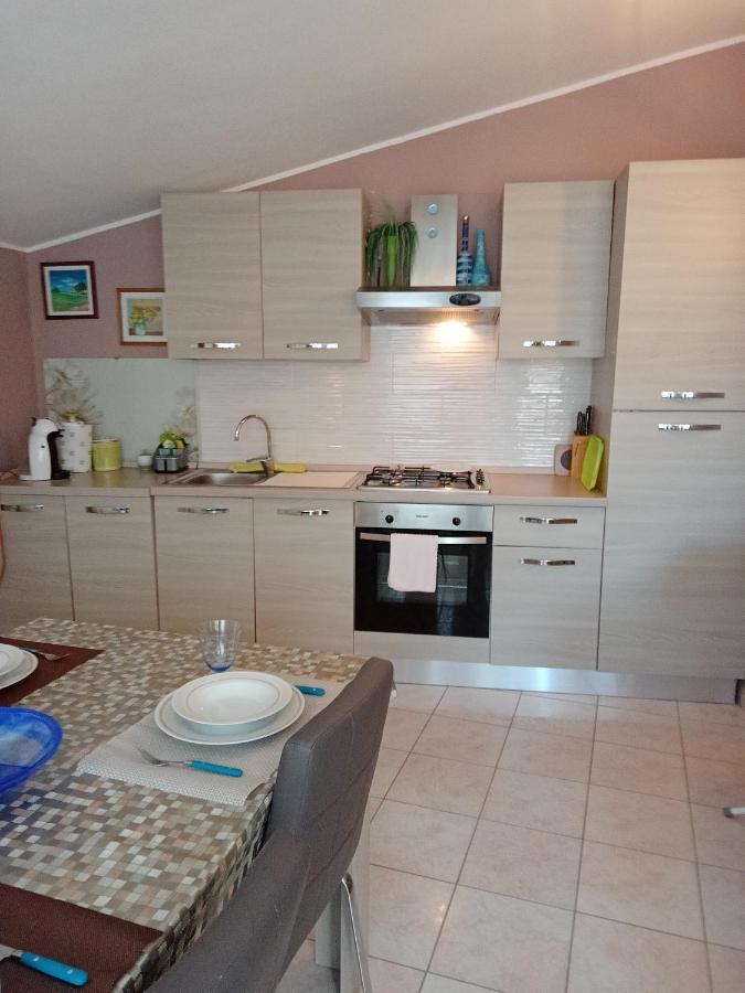 Casa Vacanza Le 2 Isole Suni Buitenkant foto
